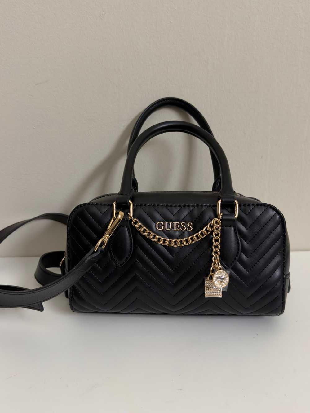 GUESS Black Quilted Satchel with Gold Chain Charm
